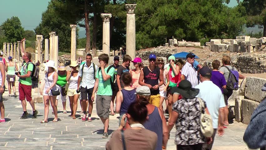 EPHESUS, TURKEY - AUGUST 15: Tourists visiting Ephesus (Efes), an ancient Greek
