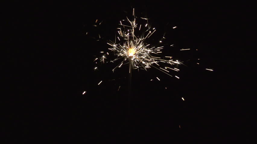 christmas sparkler with shiny glare in slow motion, high speed video