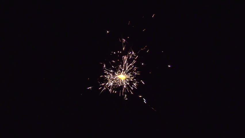 christmas sparkler with shiny glare in slow motion, high speed video