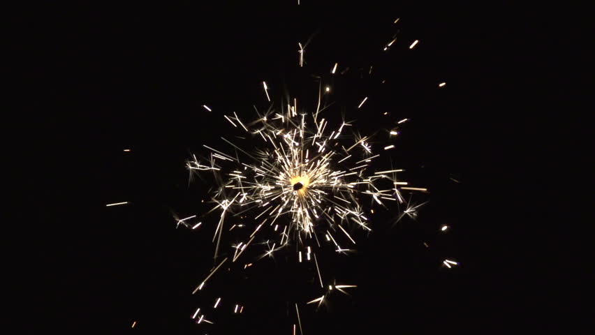 christmas sparkler with shiny glare in slow motion, high speed video