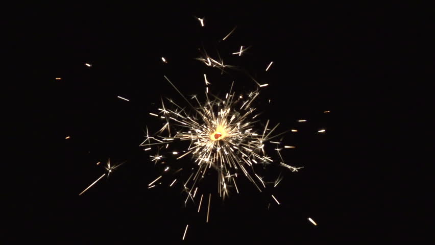 christmas sparkler with shiny glare in slow motion, high speed video