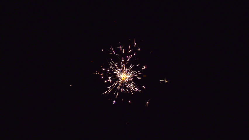christmas sparkler with shiny glare in slow motion, high speed video