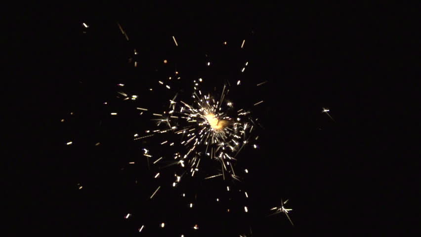 christmas sparkler with shiny glare in slow motion, high speed video