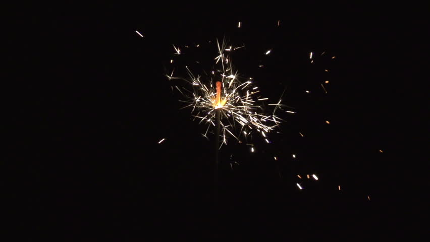 christmas sparkler with shiny glare in slow motion, high speed video