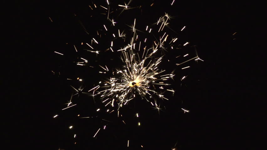 christmas sparkler with shiny glare in slow motion, high speed video