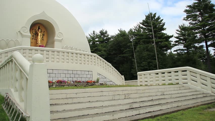 A young couple walk up the steps at the Peace Pagoda in Leverett, Massachusetts.
