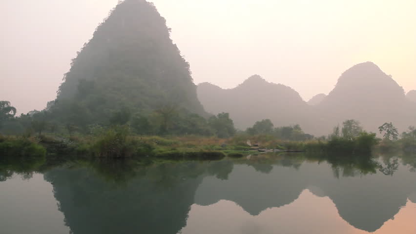 Dragon(Yulong) river Sunrise, shooting on bamboo raft. - Yangshuo Guilin,