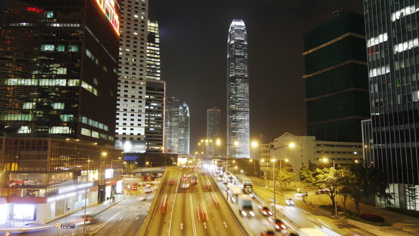 Hong Kong skyscrapers and city traffic at night