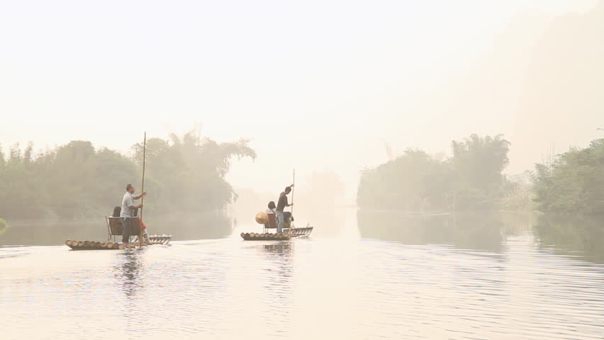 Bamboo raft on Yulong river, shooting on bamboo raft. - Yangshuo Guilin,