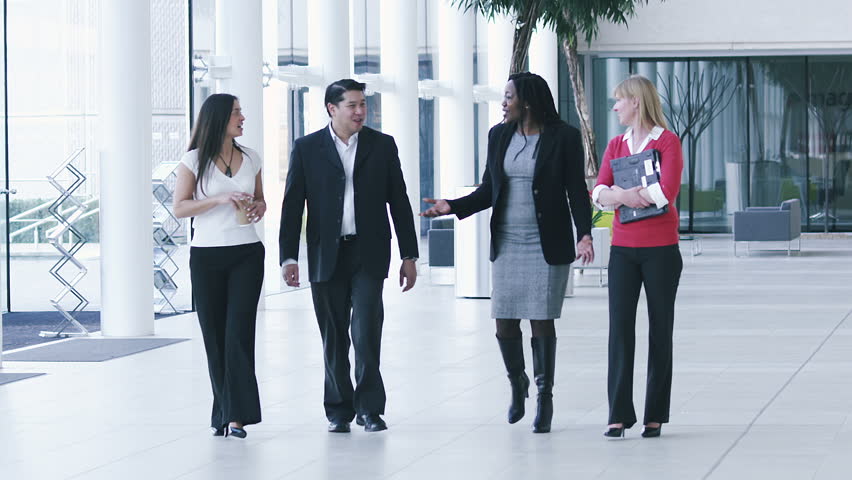 Successful and confident business people in a modern office building 