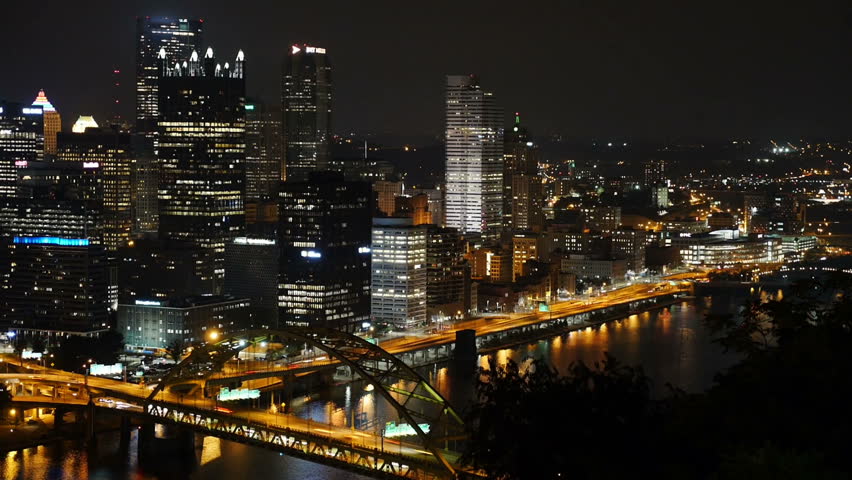 A dramatic time lapse view of traffic passing in Pittsburgh at night.