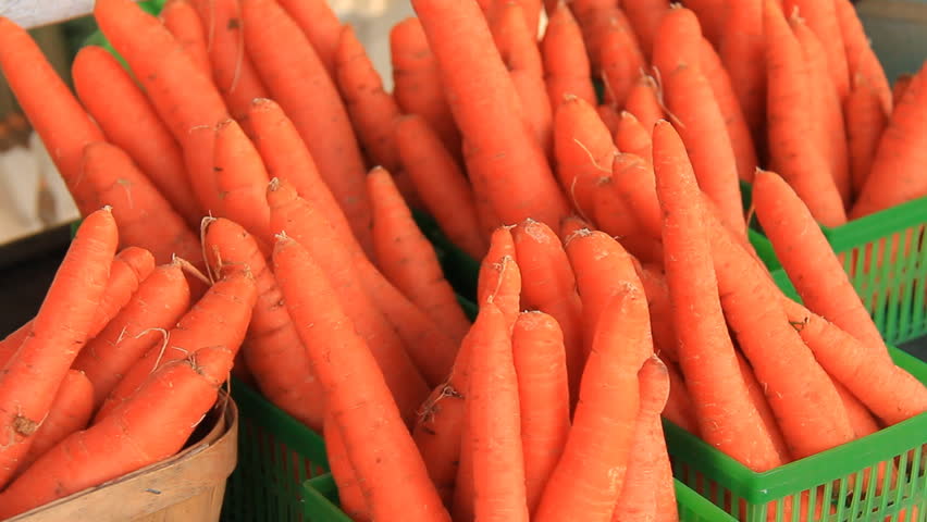 Carrots 1. Freshly picked carrots for sale at a farmers market.