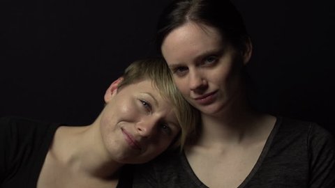 Video portrait of a female couple, moving light Arkivvideo