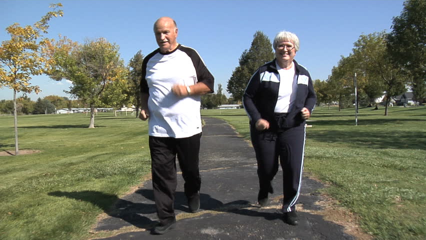 Senior couple jogging at park