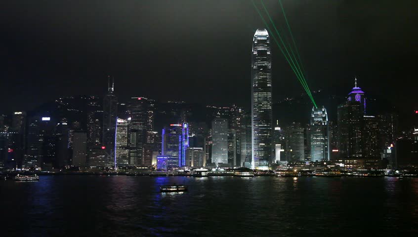 HONGKONG-July. 15, 2013. The night scene of Victoria Harbour on July. 15, 2013 in Hongkong. The harbour between the Kowloon Peninsula and the Hongkong Island of Hong Kong.