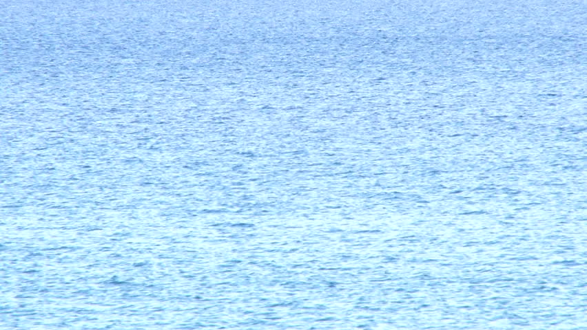 Blue ocean water background.