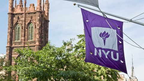 NEW YORK - AUGUST 30: NYU flag waving on August 30, 2013 in New York. NYU is a private, nonsectarian American research university based in New York City.