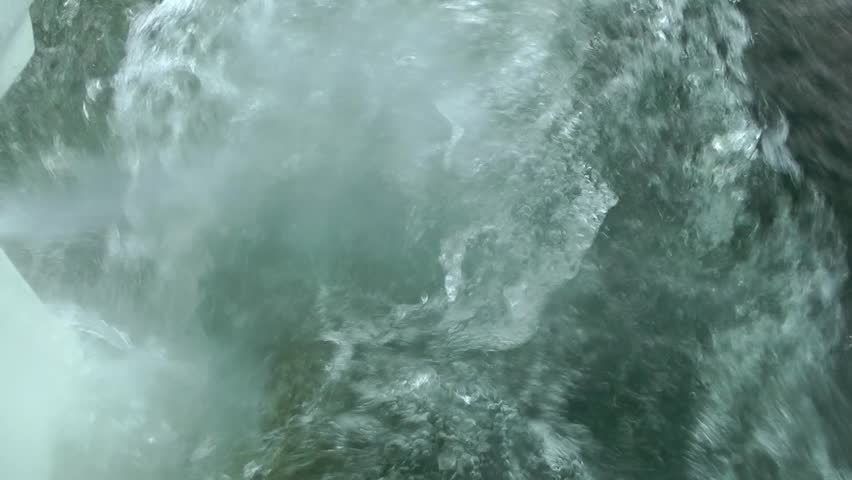 Wake from a sailing boat outboard motor 