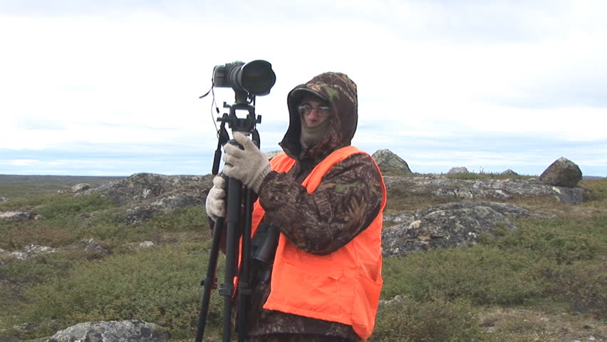 Cameraman filming Caribou migration in northern Quebec under harsh conditions.
