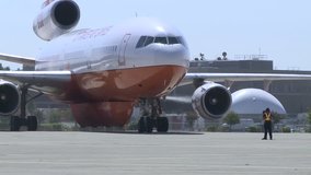DC-10 DC10 AIR FIRE TANKER PREPARING FOR TAKE OFF TO FOREST FIRES HD 1080 HIGH DEFINITION 1920X1080 STOCK VIDEO FOOTAGE CLIP