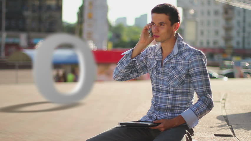Zero calls concept, young man makes free calls mobile phone