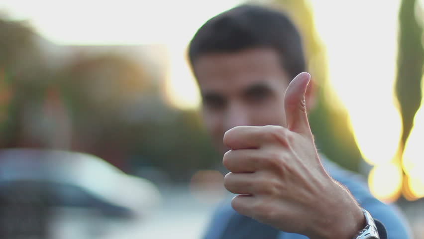 Thumb up, unrecognizable young man outdoors, like, take, buy