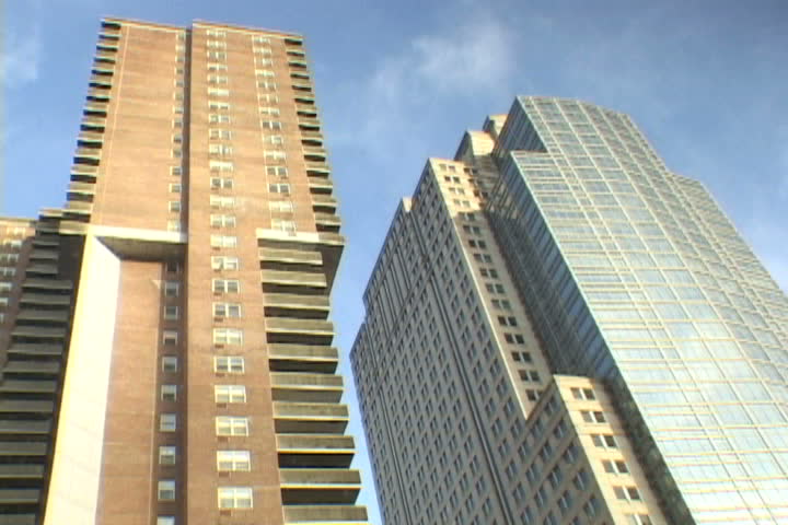 Time Lapse of New York City contrasting apartment and office buildings in