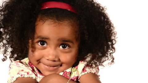 funny mixed race black and latino brazilian little girl isolated 