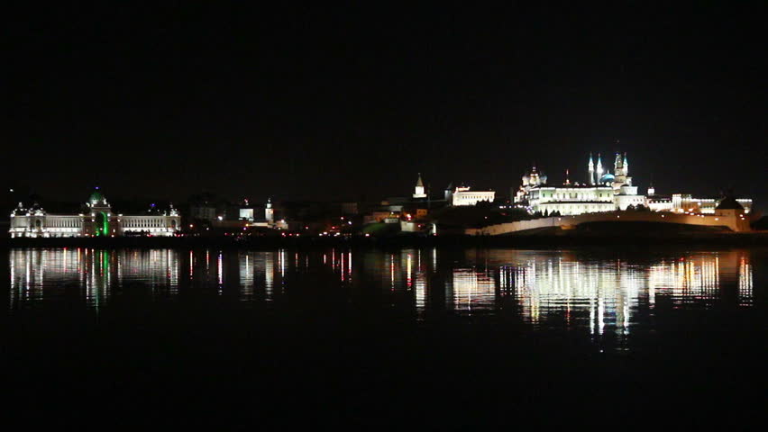 kazan kremlin with reflection in river at night in russia