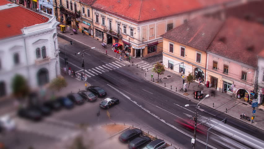 Cluj Napoca, Romania intersection with traffic  time lapse tilt shift selective focus