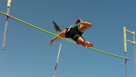 Track and Field athlete doing pole vault, slow motion Stockvideo