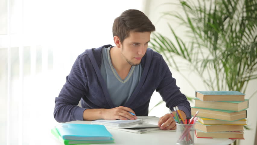 University Student Sitting at Table Stock Footage Video (100% Royalty-free) 4588565 | Shutterstock