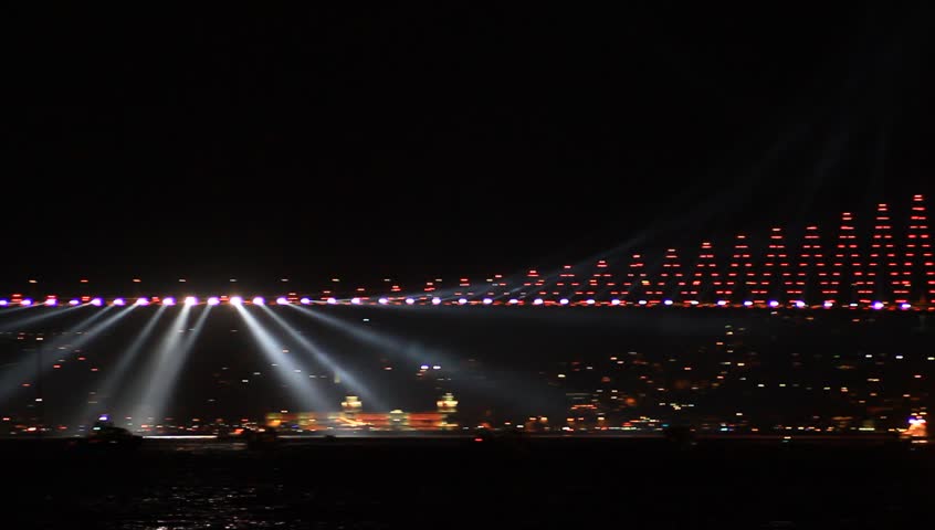 Light show in Istanbul, Turkey. Istanbul Bosporus Bridge at night.

