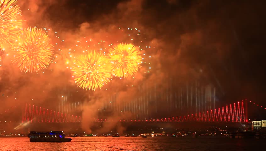 Fireworks show over Bosporus Bridge. Colorful fireworks all over the Istanbul