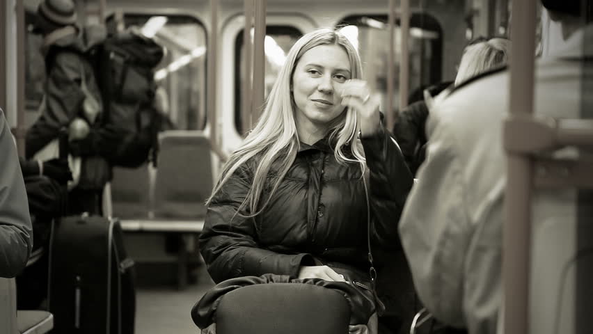 Beautiful young woman in  subway
