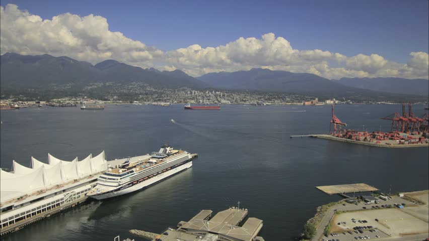 View of North Vancouver BC Canada with Water Transportation and Scenic View of Mountain Blue Sky and Moving Clouds 1920x1080