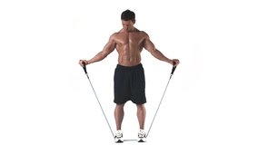 Wide shot of a muscular bodybuilder doing arm exercises with a resistance band on a white background