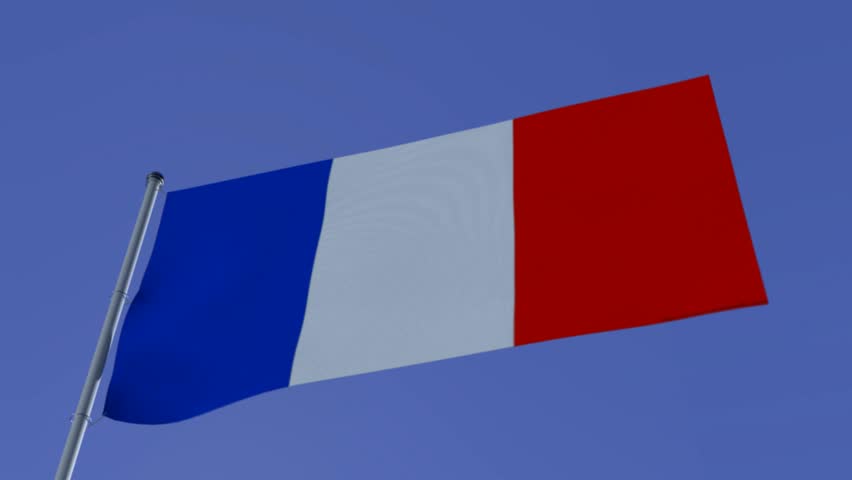French Flag waving against a blue sky