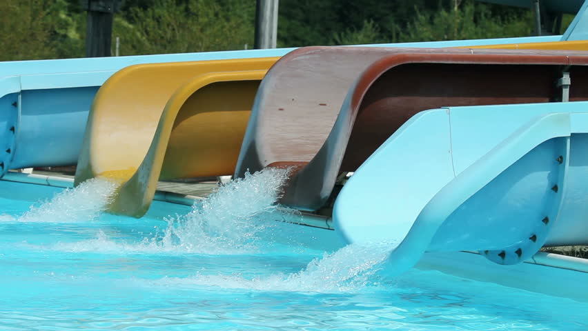 Number of water slides with kids rushing down | Shutterstock HD Video #4624805