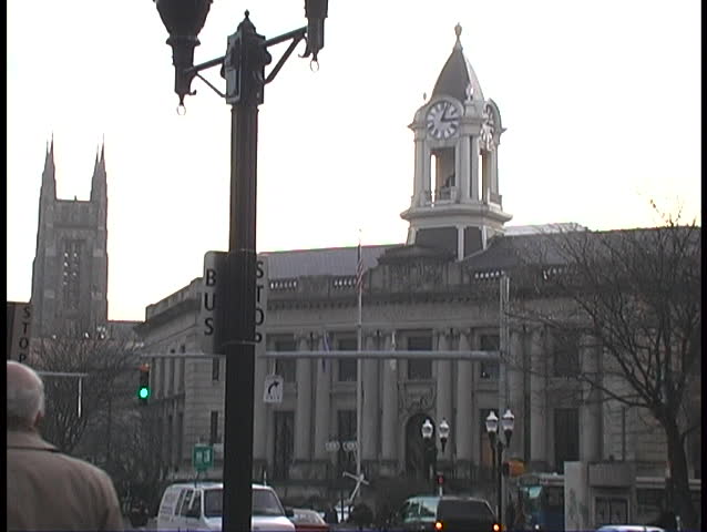Old city hall with clock tower street level