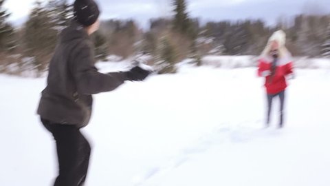 Couple has snowball fight