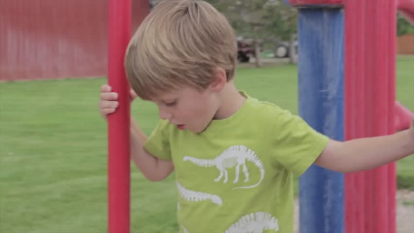 A boy playing at a local park