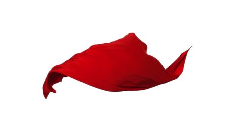 Red fabric flowing in the air on white background shooting with high speed camera, phantom flex.