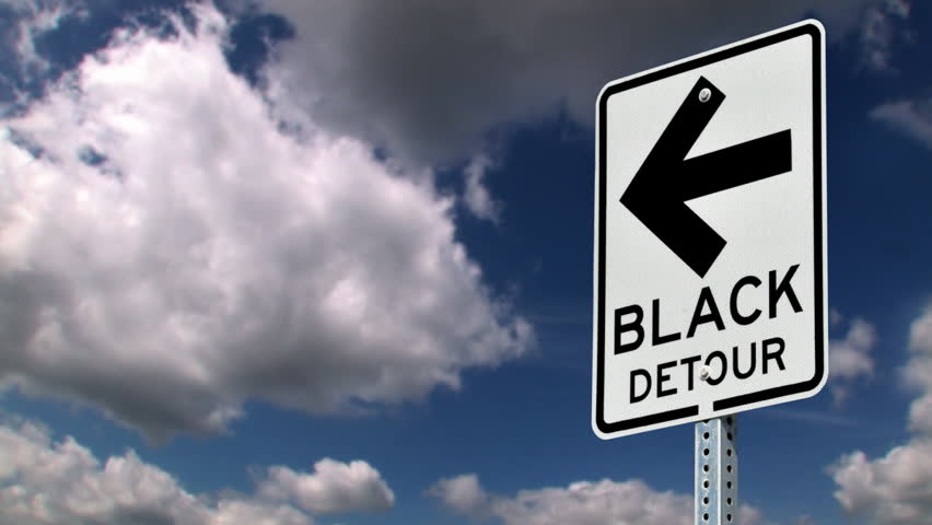 Black Detour sign.