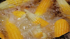 1920x1080 video - Preparation of boiled corn on the open market close up