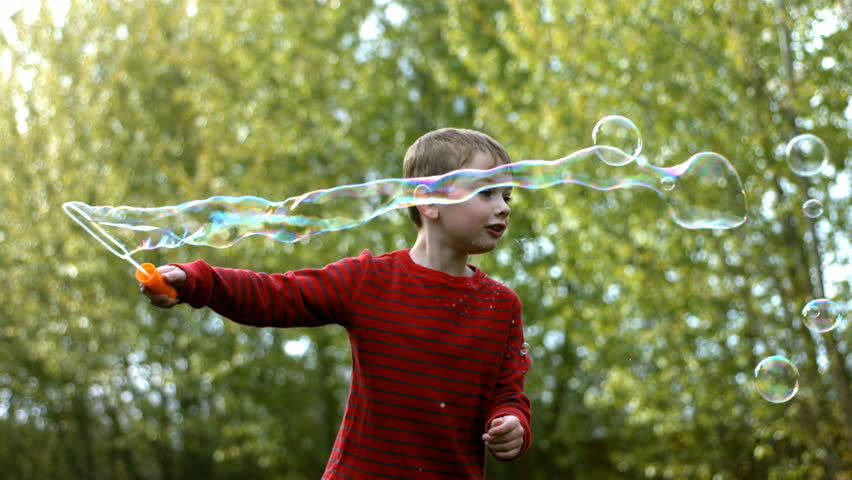 young boy making bubbles slow motion Stock Footage Video (100% Royalty ...