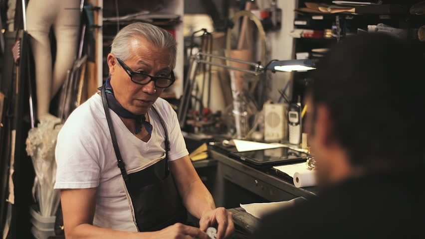 A student gets a lesson in design from a master craftsman