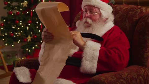 Santa Claus writes on list