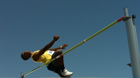 Track and Field athlete doing pole vault, slow motion Stock Video