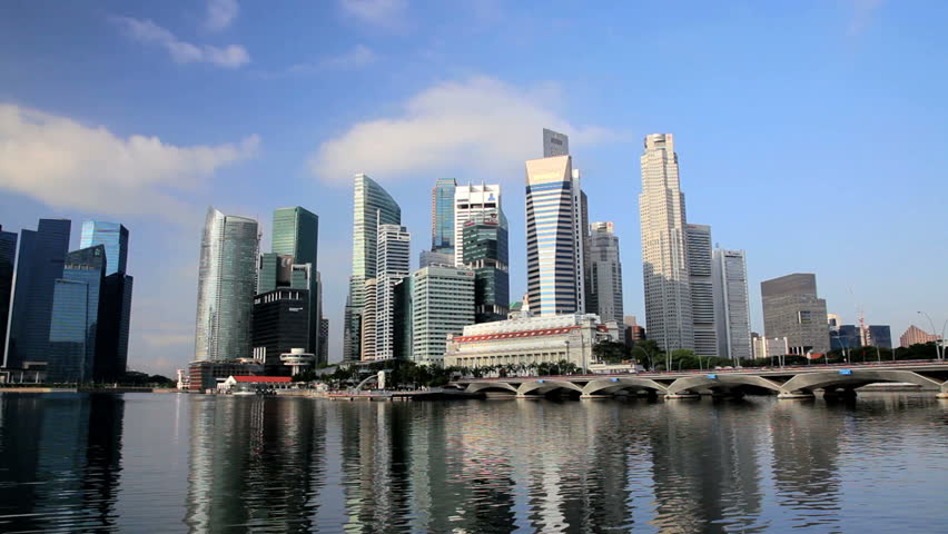 Singapore - April 2012: Singapore City Skyline and Financial district across Marina Bay under a beautiful blue sky in Singapore in April, 2012